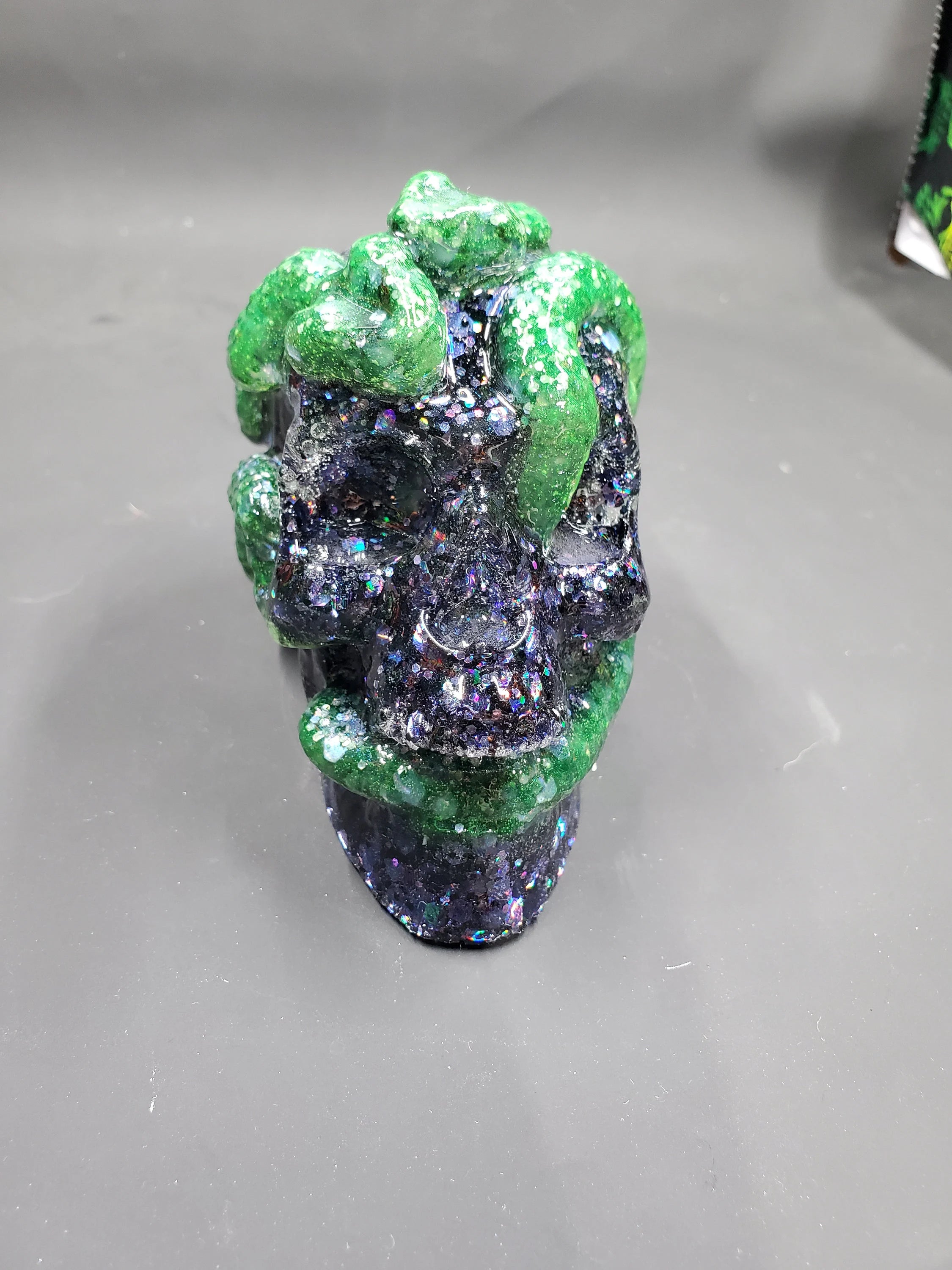 Green Glow in the Dark on Rainbow Black - Snake Resin Skull
