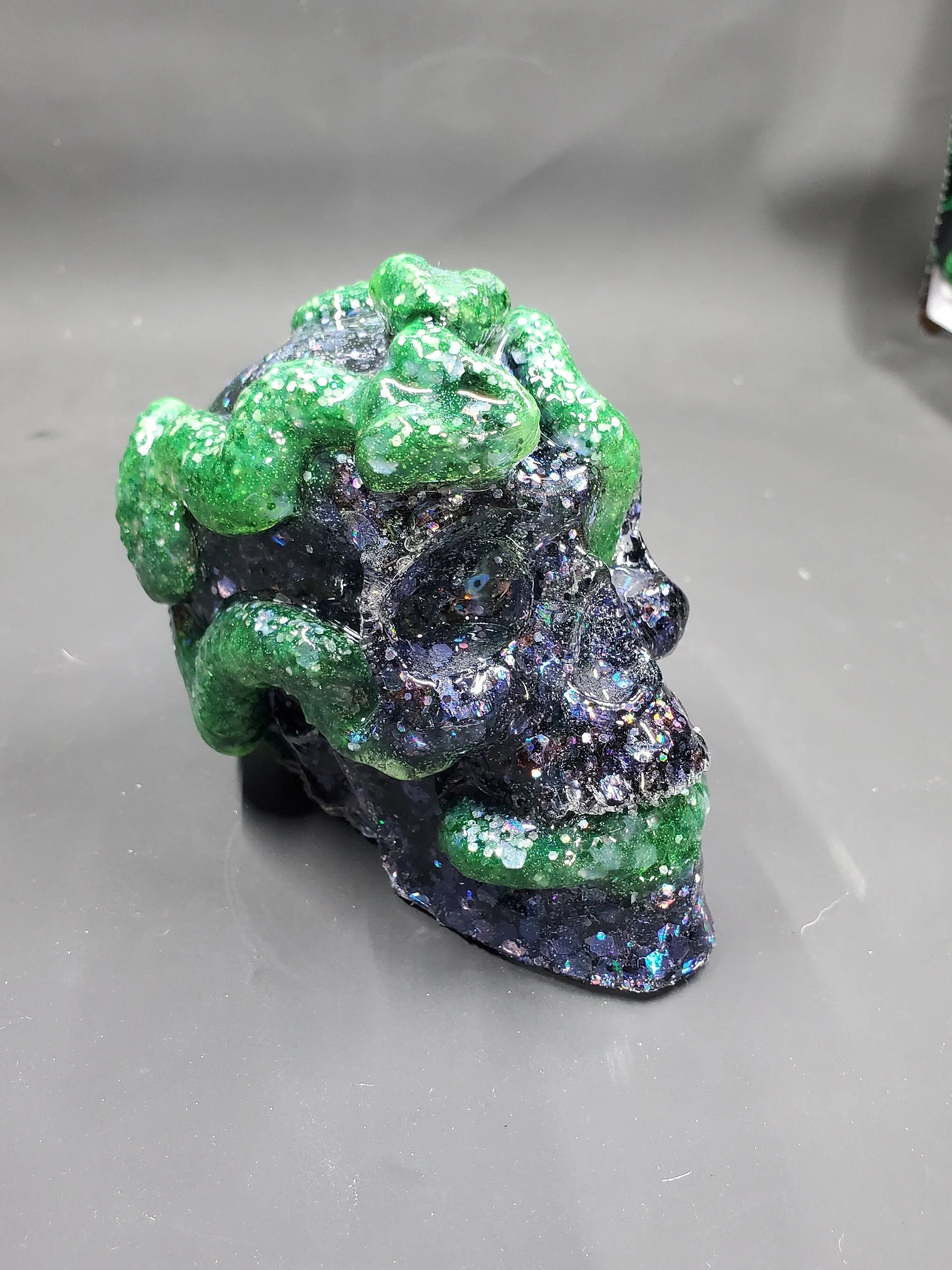 Green Glow in the Dark on Rainbow Black - Snake Resin Skull